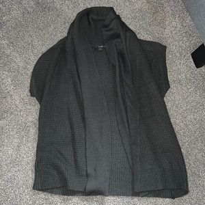 Short sleeve, small brown cardigan.